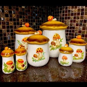 Merry Mushroom canister set with matching salt & pepper shakers.
